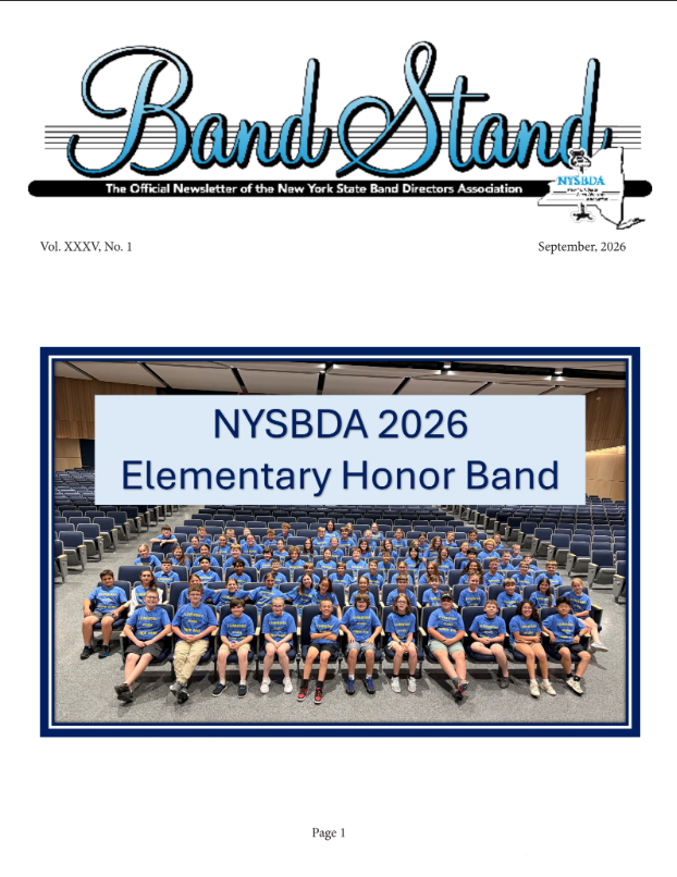 Front page of a periodical with children in matching t-shirts in an auditorium.